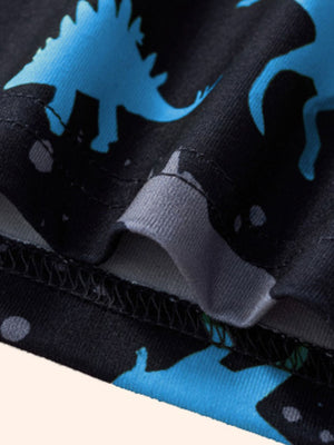 Toddler two-piece set with blue dinosaur silhouettes on black fabric.