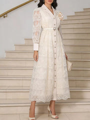 White lace midi dress with button placket, collared neckline, and belted waist.