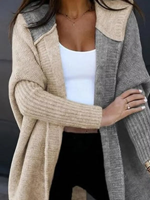 Two-tone hooded knit cardigan in camel and gray with ribbed sleeves and open front.