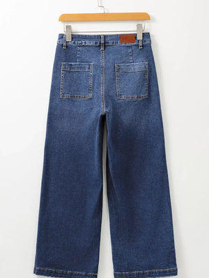 Patch pocket wide-leg jeans in medium wash denim with a relaxed fit.