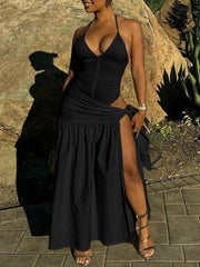 Black halter neck ruched maxi dress with deep V-neck and high slit