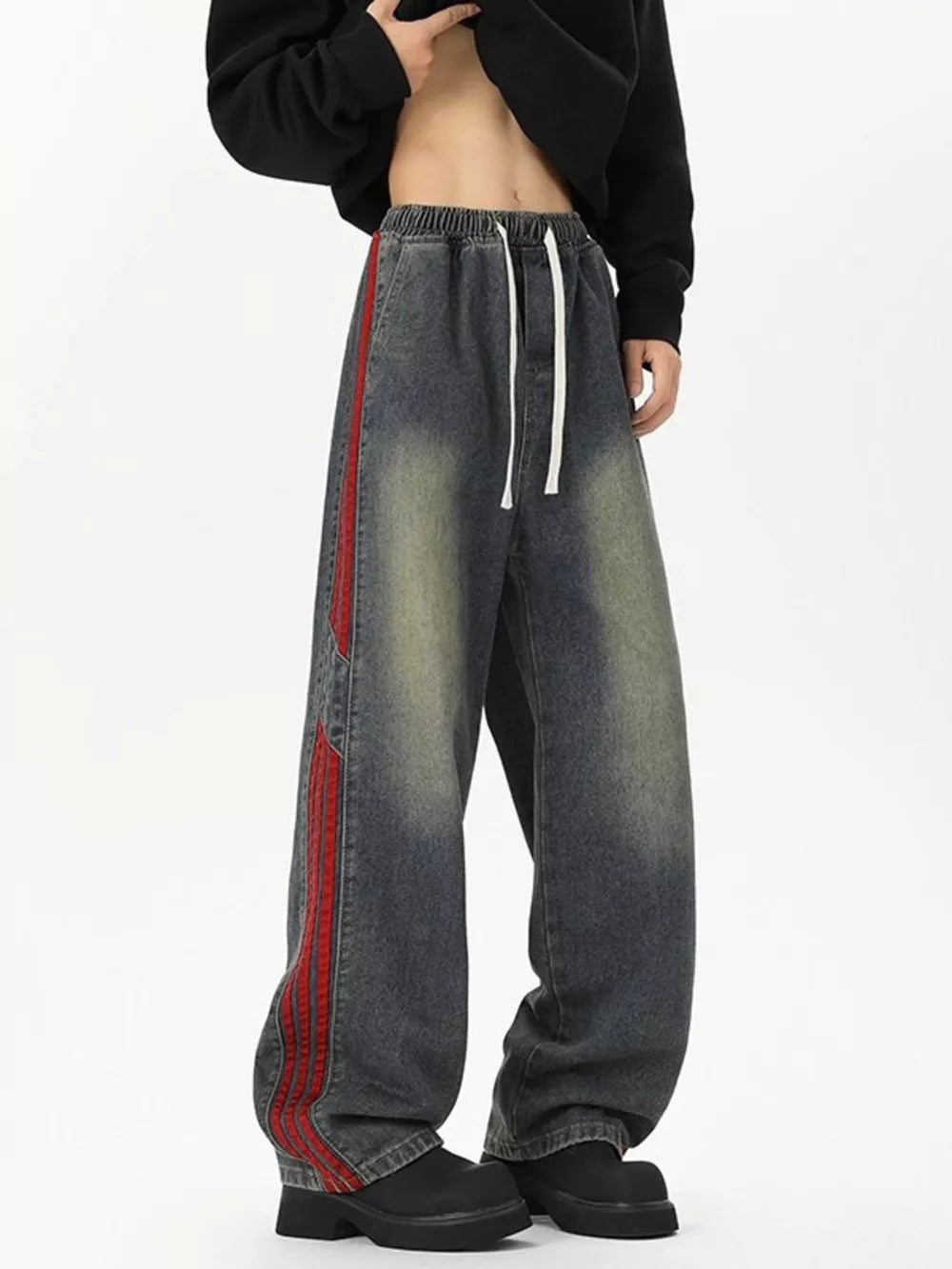 Relaxed fit wide-leg jeans in Vintage Blue with red striped detail and drawstring waist.