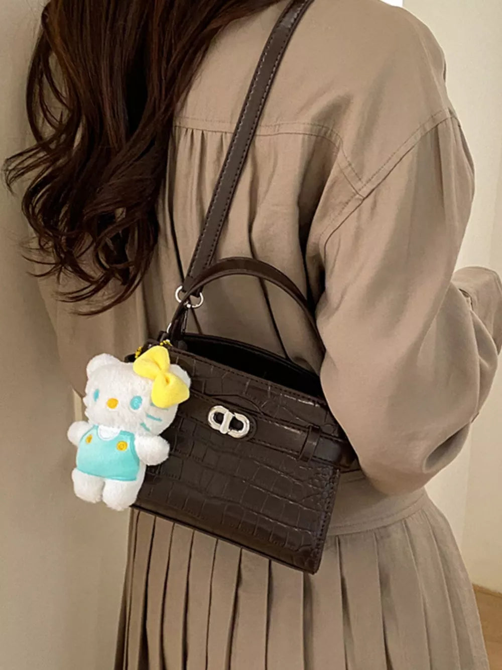 Crocodile Embossed Crossbody Bag in Brown, model styling view