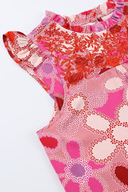 Floral embroidered yoke ruffle sleeve blouse in strawberry pink with a floral print.