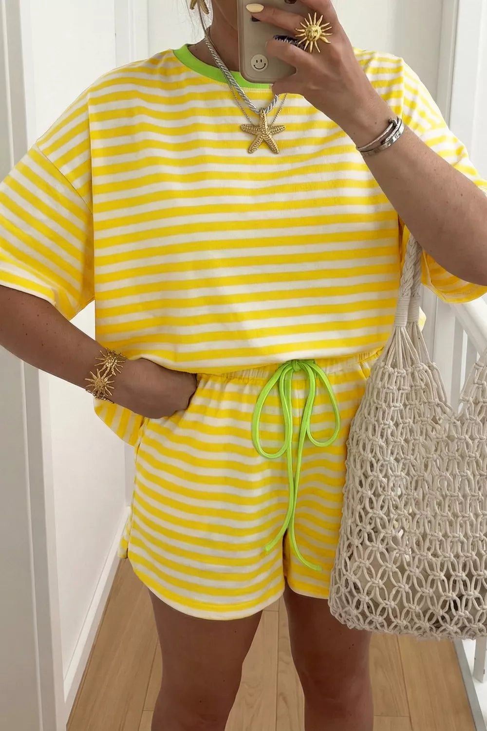 Yellow and white striped cotton two-piece set with drawstring shorts and short sleeve tee.