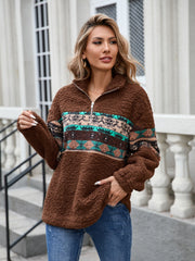 Brown sherpa quarter-zip pullover with Aztec trim and a relaxed fit.