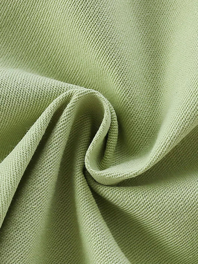 Light green cotton blend fabric texture detail