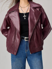 Plum purple faux leather biker bomber jacket with a zip front and cinched waist.