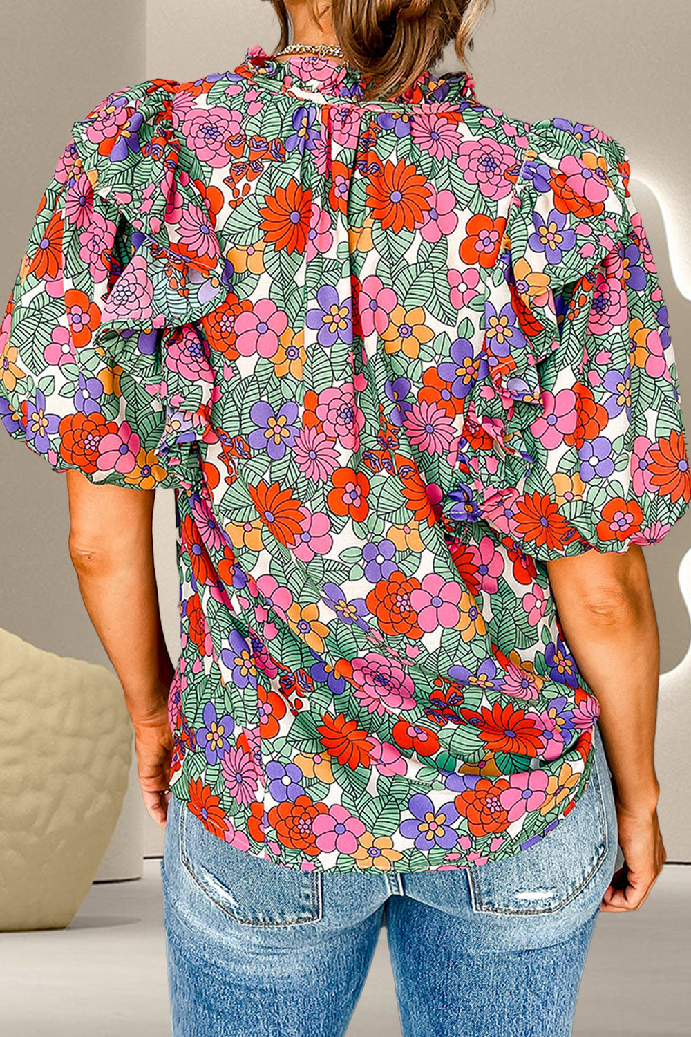 Retro floral puff sleeve blouse with ruffle detail, 100% viscose, casual styling.