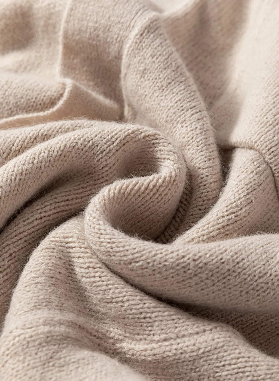 Oversized sleeve maxi cardigan in Dust Storm color, showing a close-up of the soft knit texture.