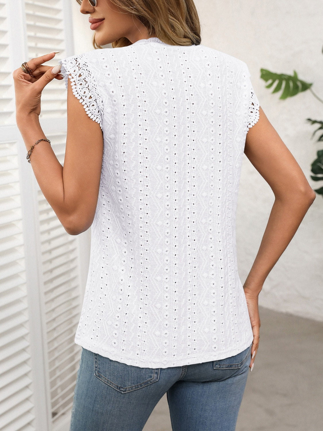 White eyelet cap sleeve blouse with lace trim detail