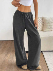 Dark gray casual wide-leg drawstring maternity pants with a relaxed fit.