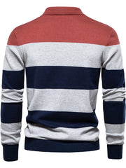 Colorblock knit polo with ribbed collar in coral, gray, and navy stripes.