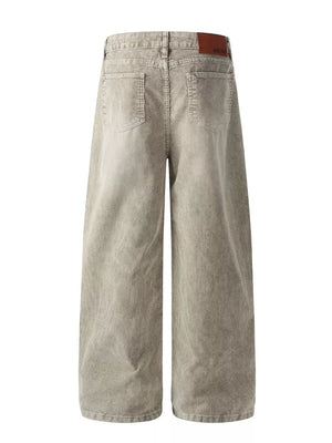 Men's gray wide-leg corduroy joggers with back pockets and a brown brand tag.