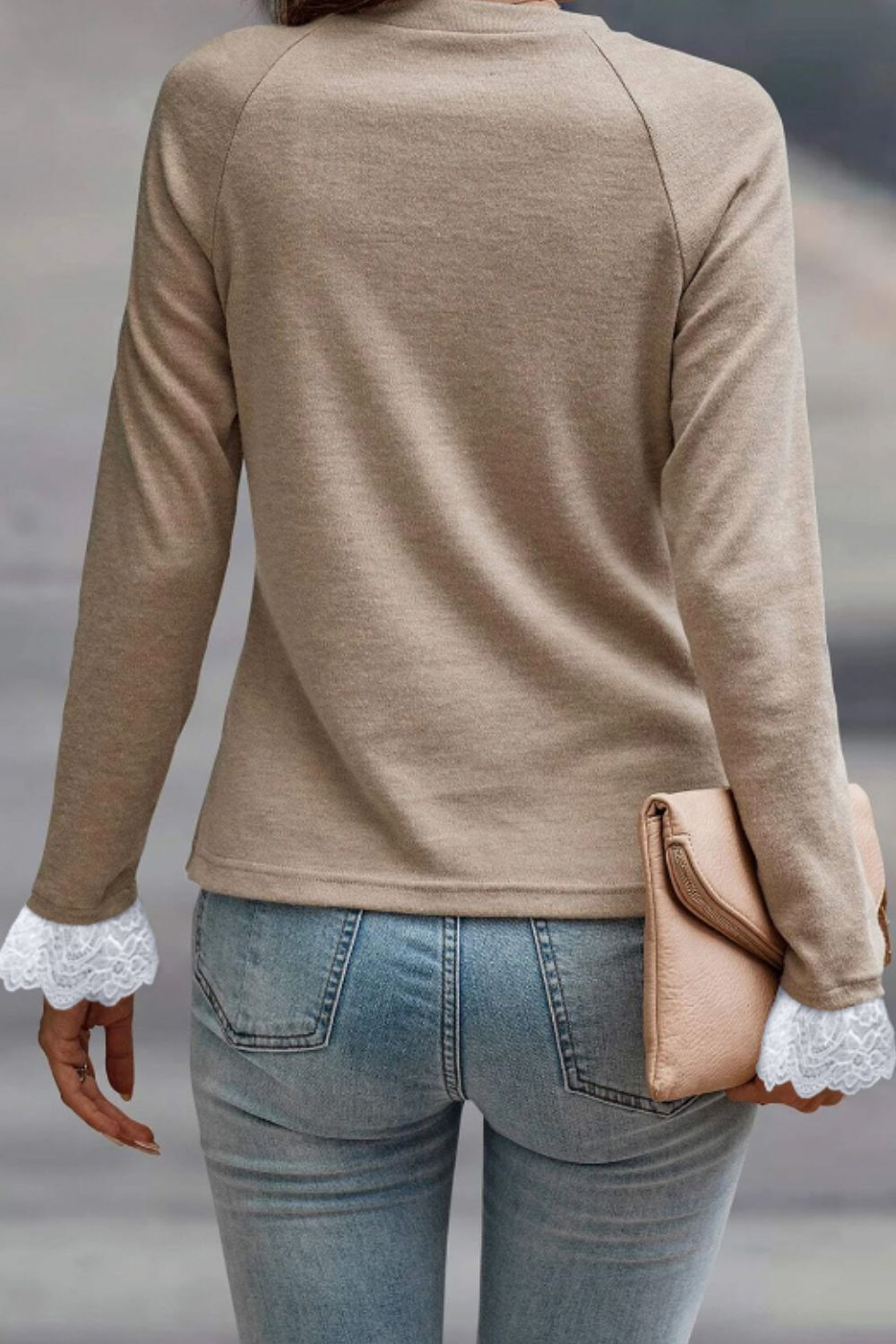 Khaki long sleeve top with lace cuffs and pleated yoke detail