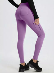 Purple high-waisted active pants with cargo pockets and back pockets.