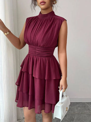 Dark Red sleeveless ruffle tiered dress with ruched bodice and waist detail.
