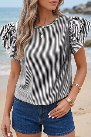 Black and white striped polyester shirt with ruffled short sleeves and a crew neck.
