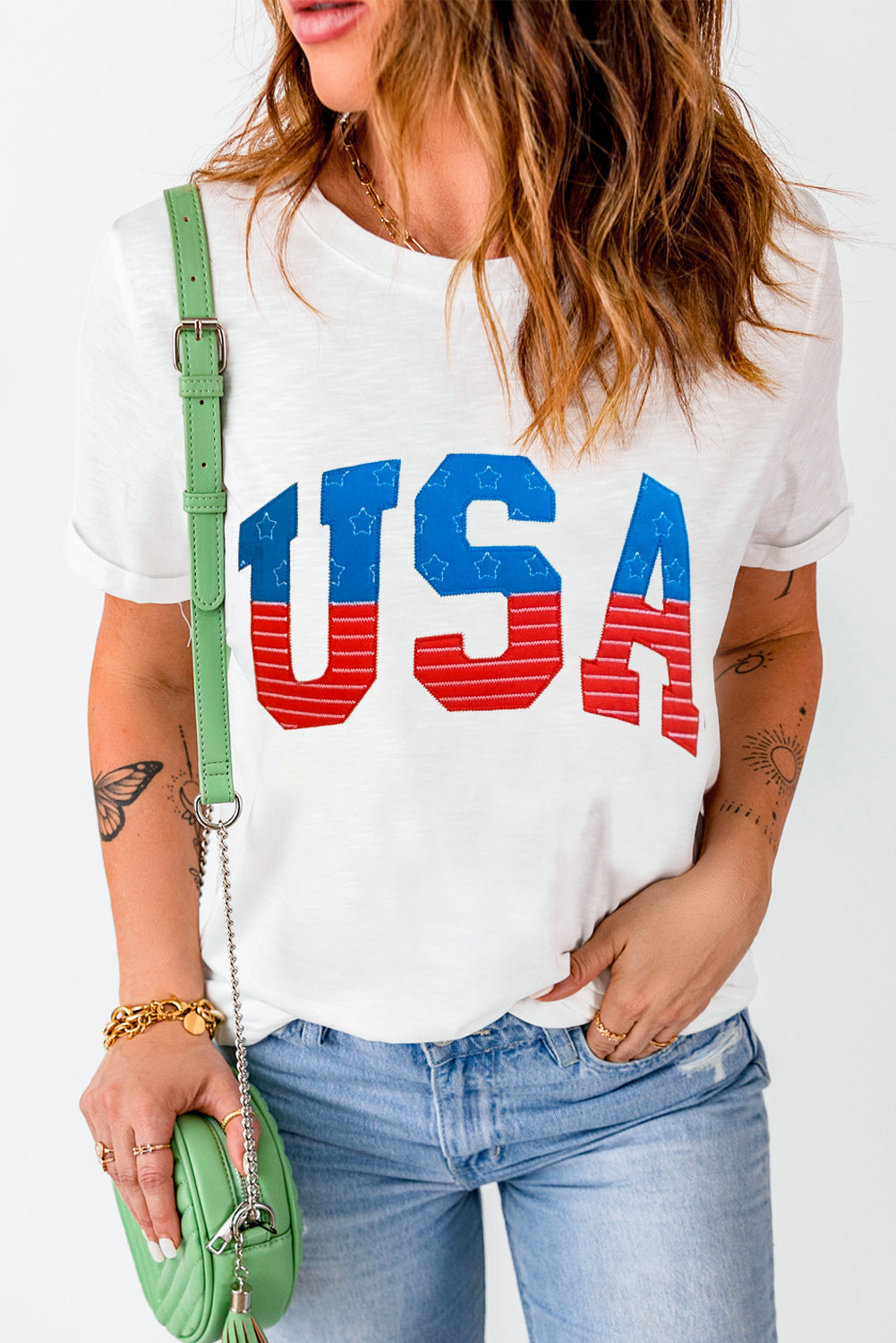 White t-shirt with USA appliqué and rolled cuffs