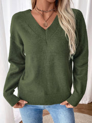 Army green acrylic v-neck sweater with a twisted back detail and ribbed cuffs and hem.