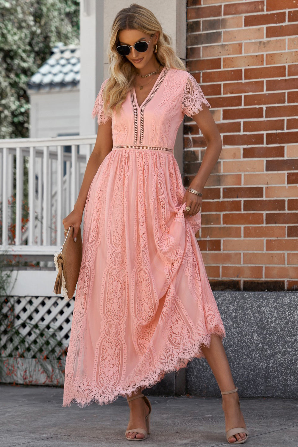 Peach lace midi dress with scalloped hem and short sleeves.