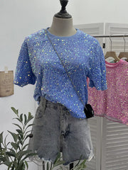 Blue crew neck t-shirt with iridescent sequin embellishments, short sleeves.