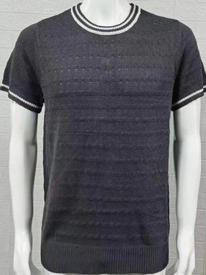 Textured knit t-shirt in black with white striped neckline and cuffs.