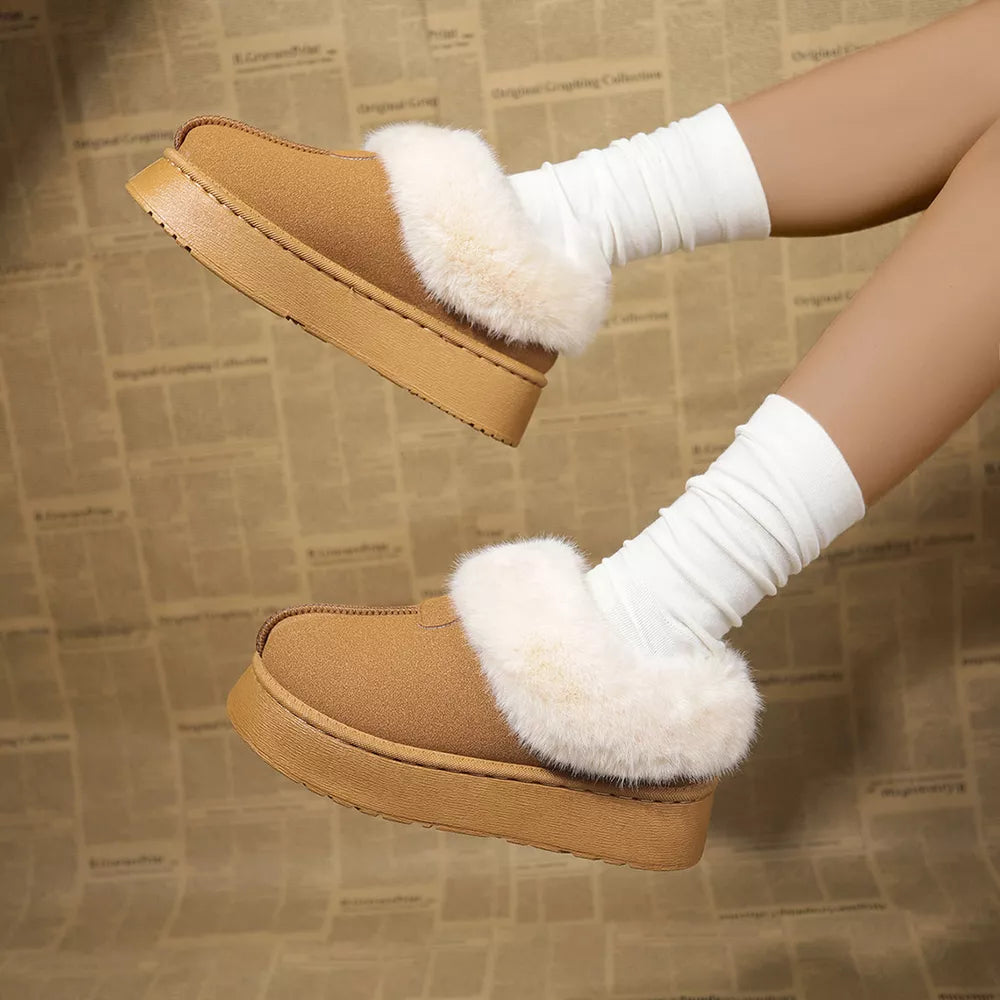 Brown plush suede platform slippers with white faux fur trim and white slouch socks.
