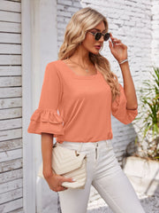 Peach ruffled sleeve square neck blouse with layered bell sleeves.