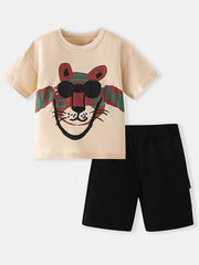 Cream cotton tee with tiger graphic and black shorts baby outfit.