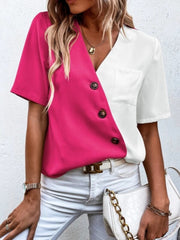 Two-tone asymmetric button-down shirt in hot pink and white with a pocket and button details.