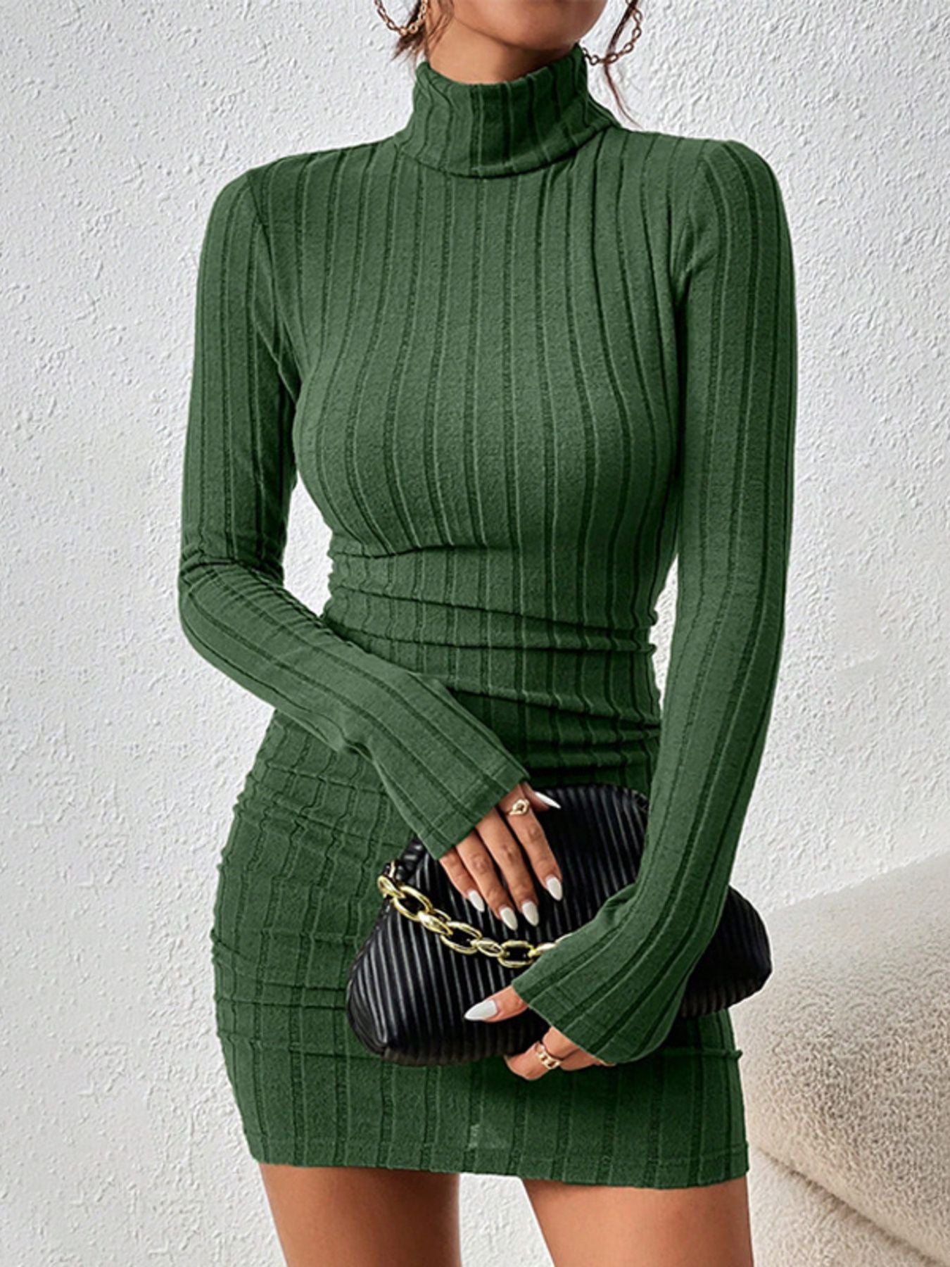 Green ribbed turtleneck bodycon mini dress with long sleeves.