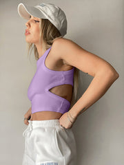 Lavender ribbed cutout crop top with a high neckline and sleeveless design.