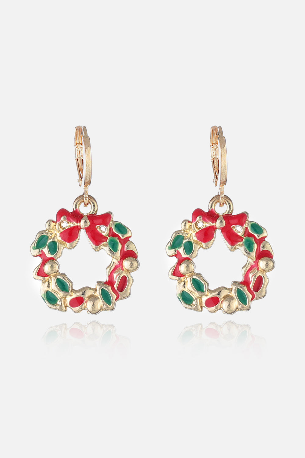 Festive Santa Charm Hoop Earrings with red bows and green leaves on gold alloy.