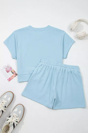 Light blue cotton crew neck t-shirt and drawstring shorts set with ribbed cuffs