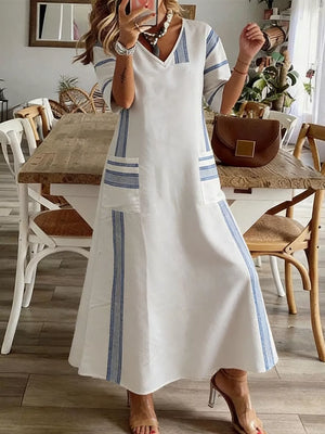 Maxi dress with blue stripes, V-neck, short sleeves, and pockets.