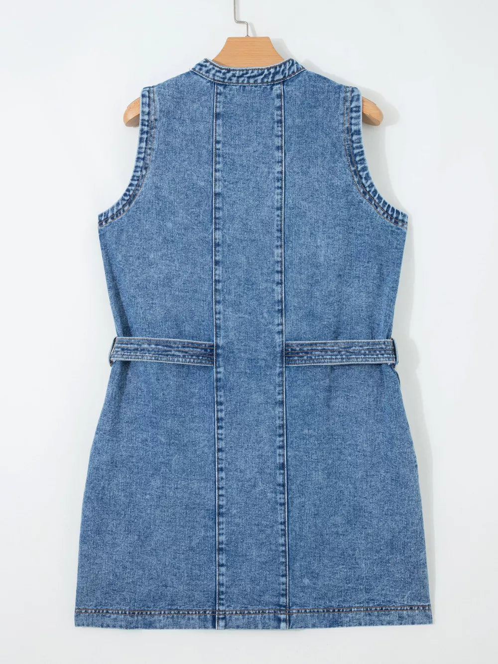 Belted denim dress with button front, sleeveless, collared, and a cinched waist.