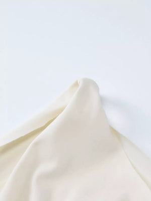 Apricot draped maxi dress fabric detail