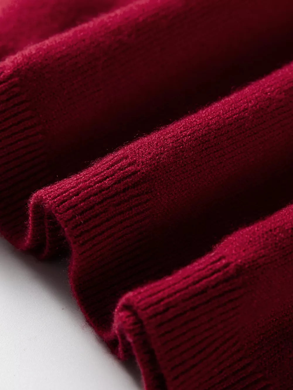 Burgundy crew neck cap sleeve sweater with ribbed texture detail