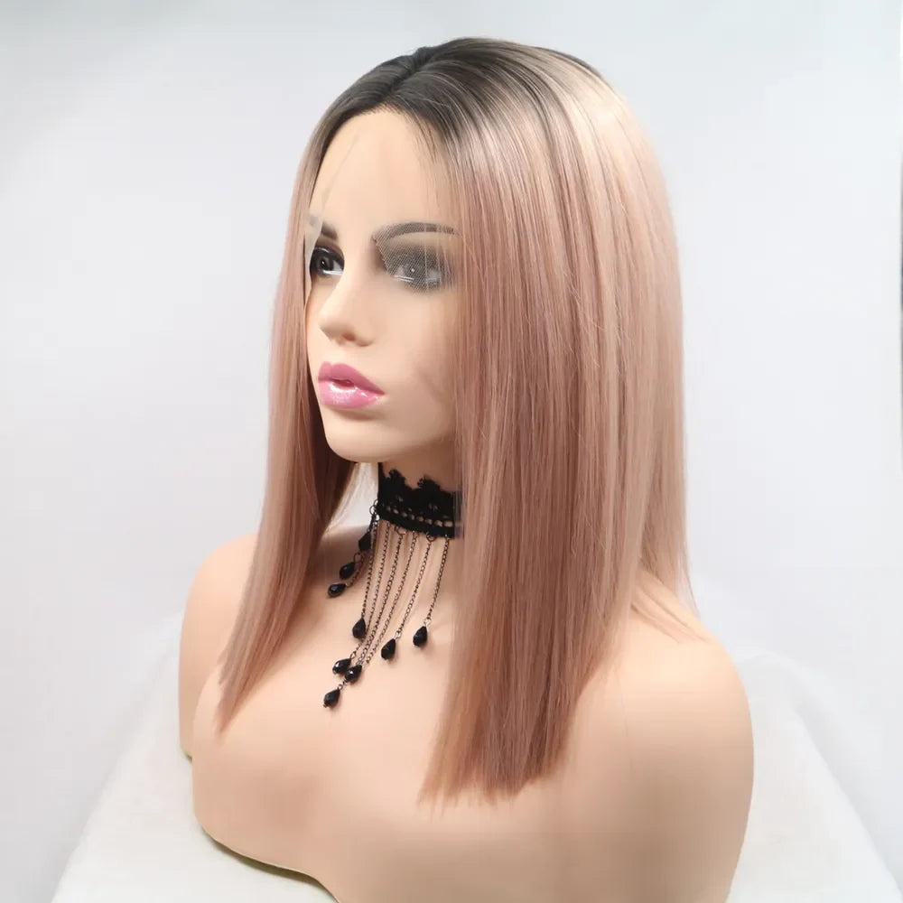 Ombre bob wig in black and pink, styled straight with a center part.