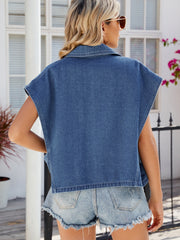 Denim double-breasted sleeveless jacket in dusty blue with a collar and button details.