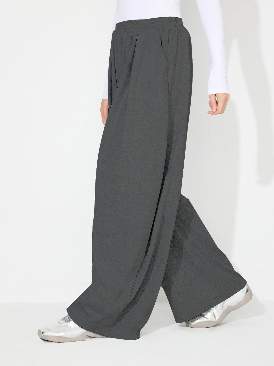 Dark Gray pleated drape palazzo trousers with a wide leg and elastic waistband.