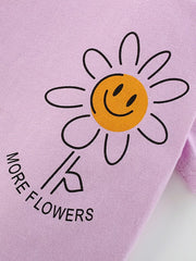 Girls' lilac cotton blend tee with smiley daisy graphic and text.