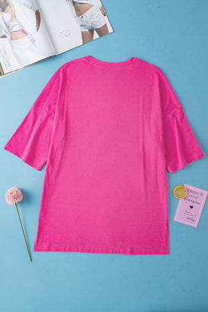 Pink cotton boxy tee with shoulder stitch detail and crew neck.