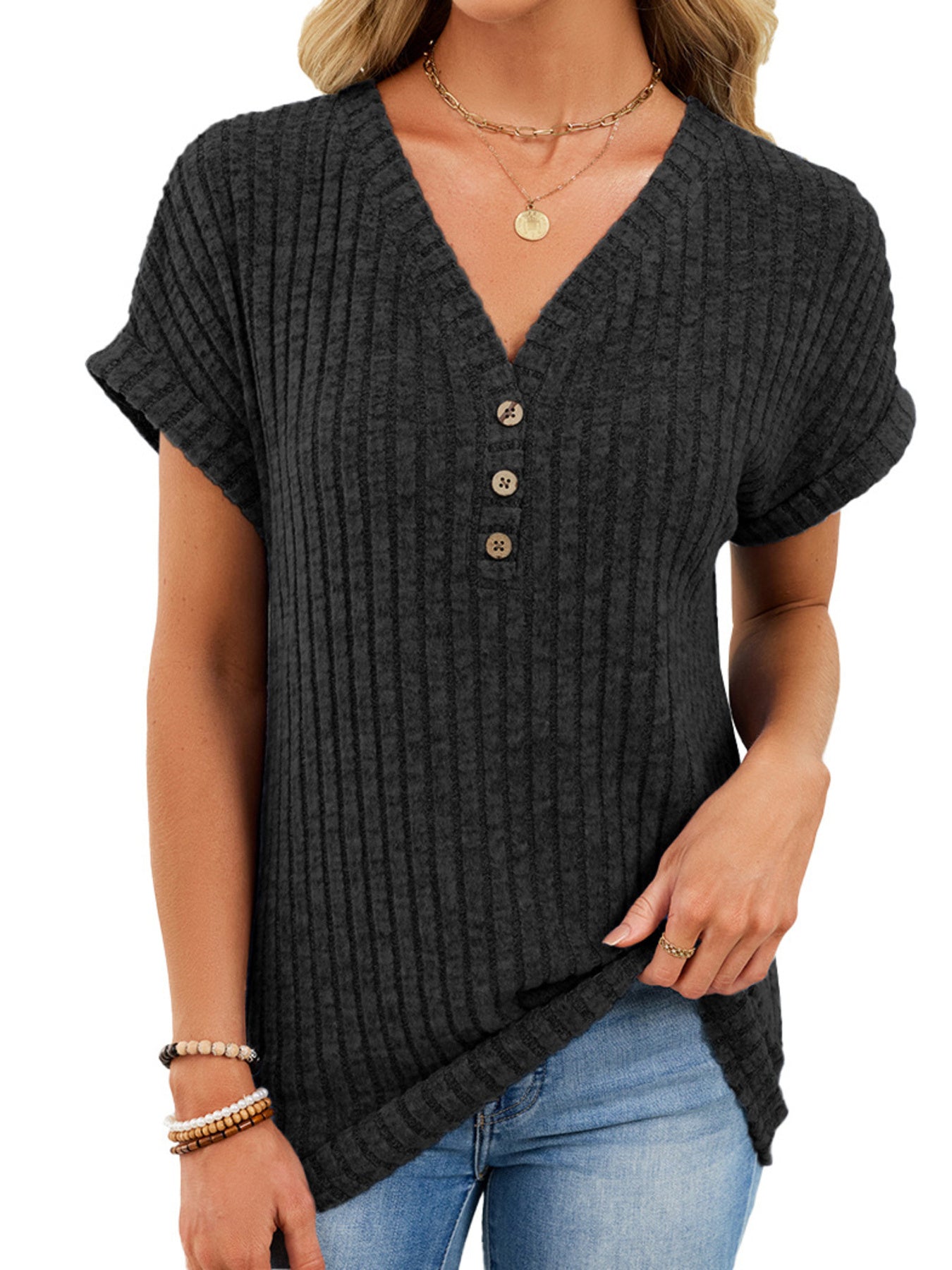 Black ribbed knit v-neck t-shirt with three buttons and short sleeves.
