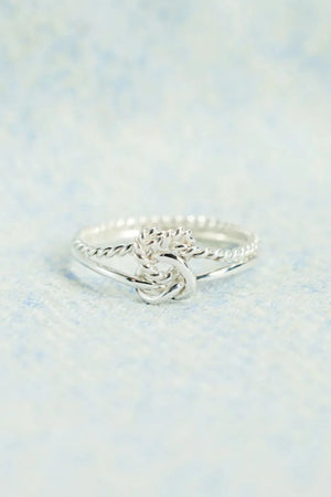 Silver rope knot ring in 925 sterling silver with a twisted band detail.