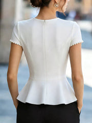 White peplum t-shirt with pearl-embellished short sleeves and a back zipper.