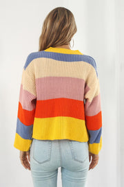 Rainbow block stripe knit cardigan with yellow, blue, pink, and orange stripes.