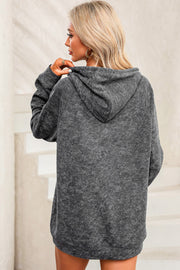 Textured charcoal gray hoodie with raglan sleeves and a relaxed fit.