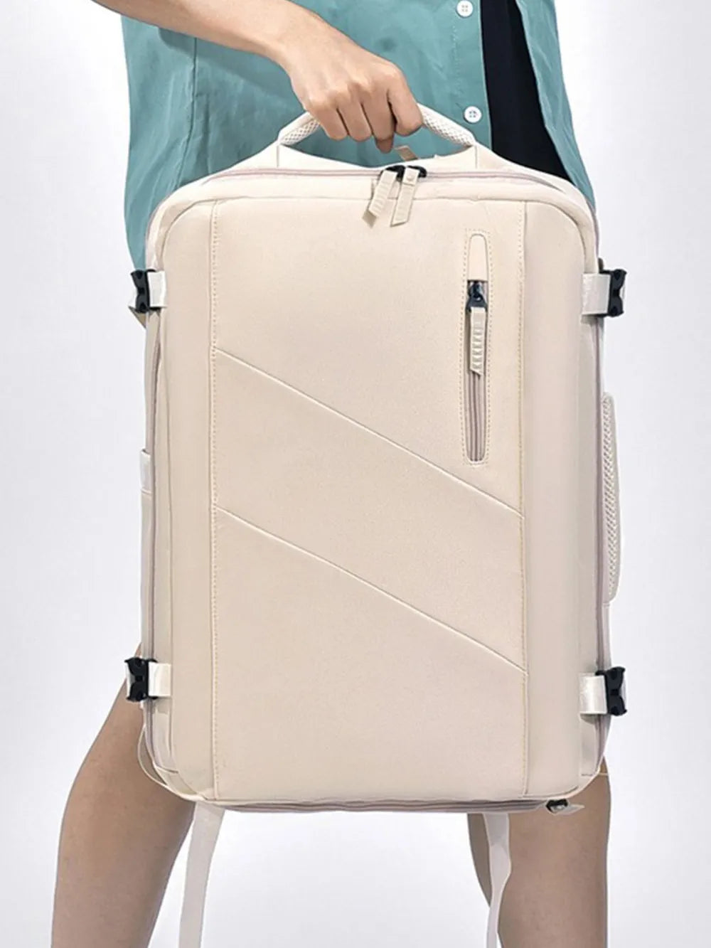 Beige structured backpack with shoe compartment and adjustable straps